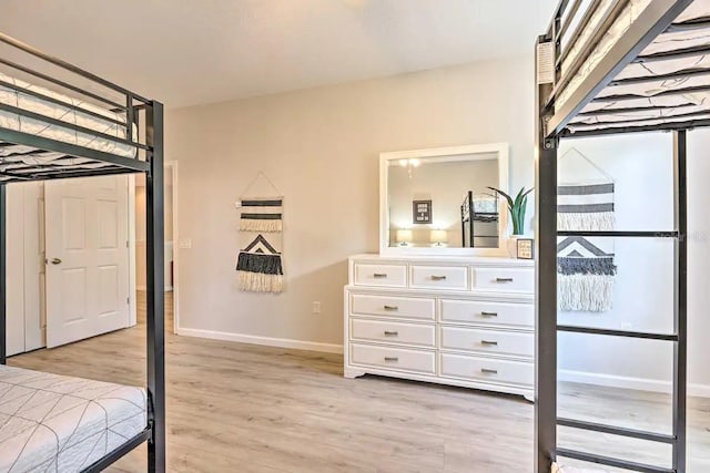 bedroom with light hardwood / wood-style flooring