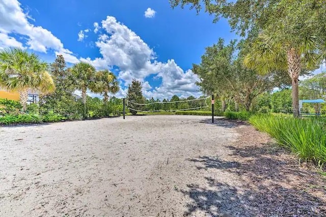 view of home's community with volleyball court