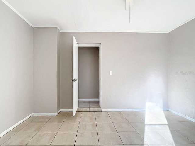 empty room featuring light tile floors