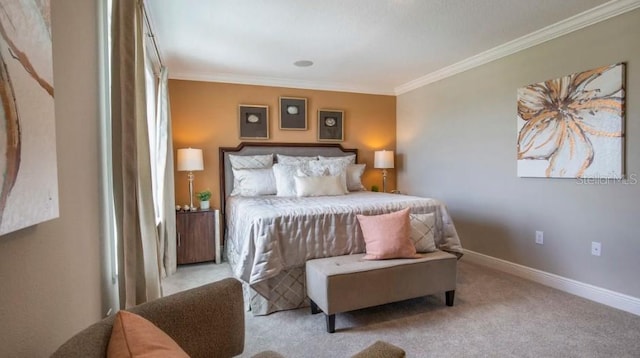 bedroom with ornamental molding and light carpet