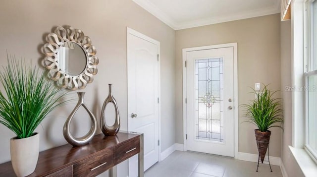 doorway to outside featuring ornamental molding, plenty of natural light, and light tile patterned flooring