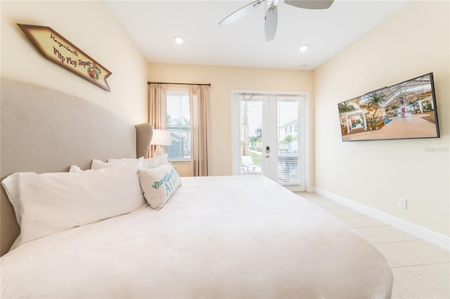 bedroom featuring french doors, light tile flooring, ceiling fan, and access to outside