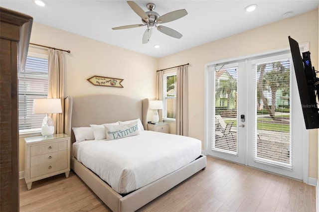 bedroom with french doors, ceiling fan, access to exterior, and light hardwood / wood-style flooring