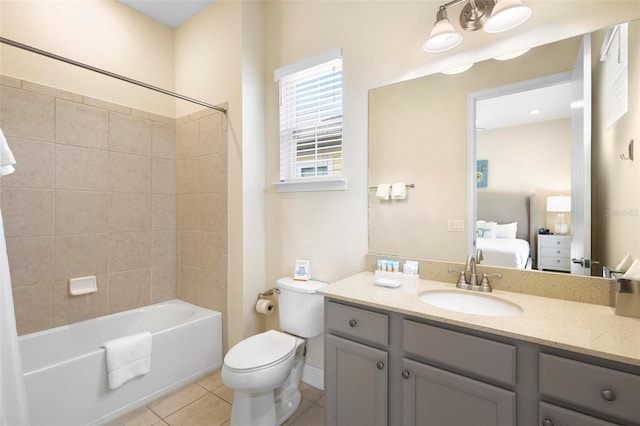 full bathroom with toilet, tile floors, shower / bathtub combination with curtain, and vanity