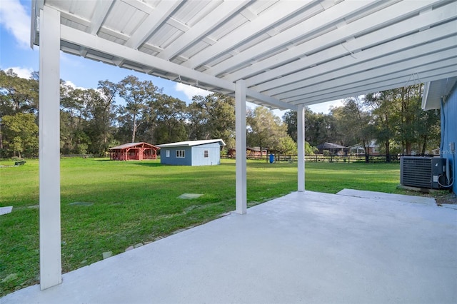 view of patio featuring central AC and an outdoor structure