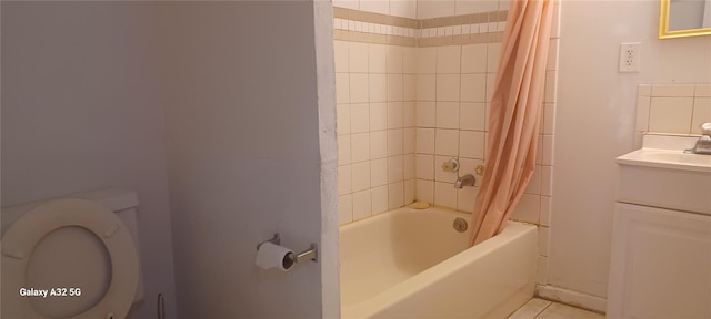 full bathroom with shower / tub combo, toilet, tile flooring, and large vanity