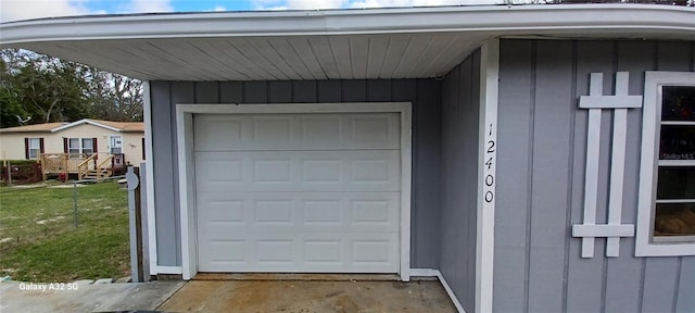 garage with a lawn