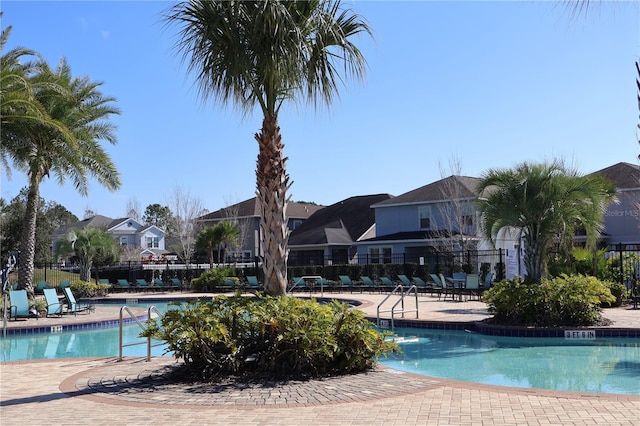 view of swimming pool with a patio