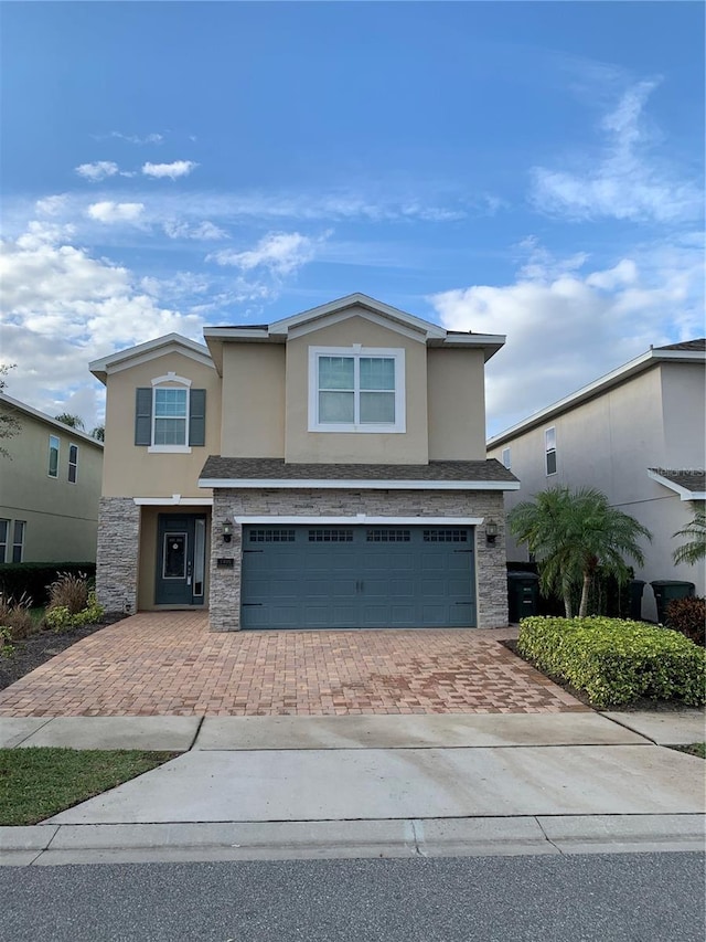 view of front of property featuring a garage