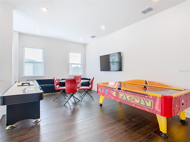 recreation room featuring dark hardwood / wood-style floors