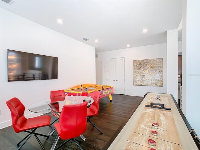 recreation room with dark hardwood / wood-style flooring