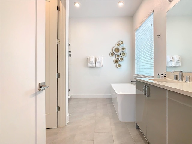 bathroom featuring vanity and tile flooring