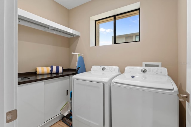 laundry room with washer and dryer