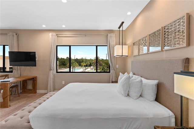 bedroom with light colored carpet