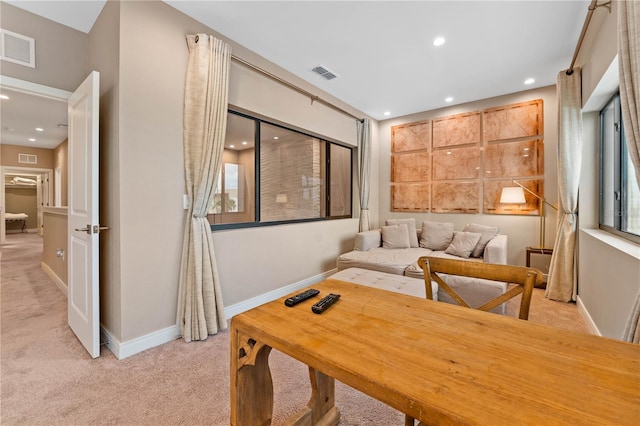 view of carpeted dining space