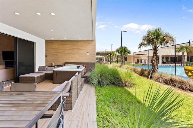 exterior space with outdoor lounge area and a yard