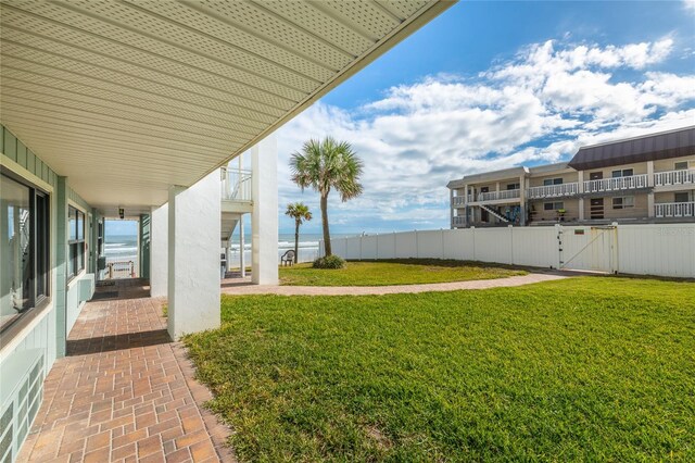 view of yard featuring a balcony