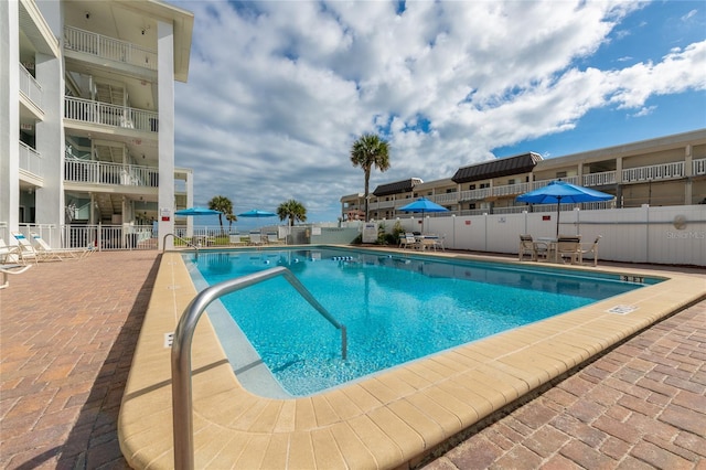 view of pool featuring a patio area