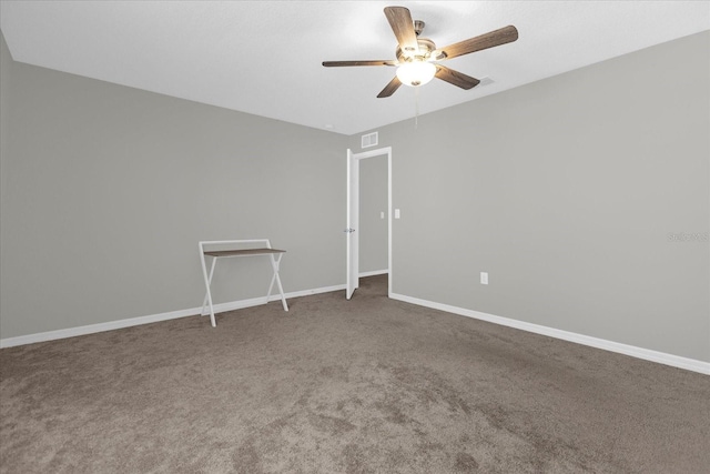 carpeted empty room with ceiling fan