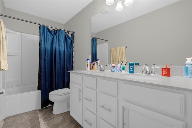 full bathroom with toilet, shower / tub combo with curtain, double sink vanity, and tile flooring