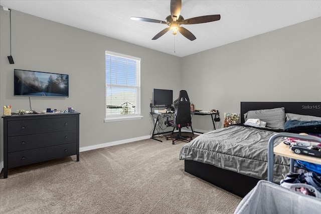 carpeted bedroom featuring ceiling fan