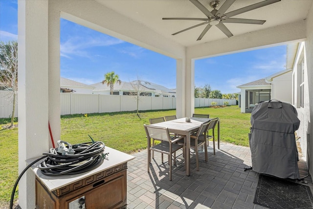 view of patio / terrace featuring area for grilling and ceiling fan