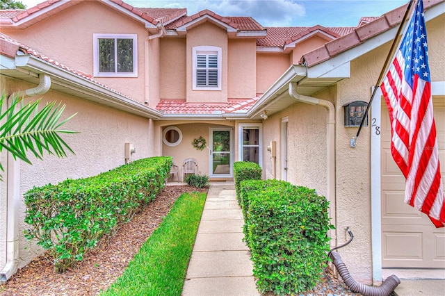 view of front of property featuring a garage