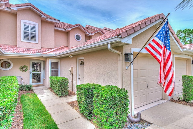 view of front of home with a garage