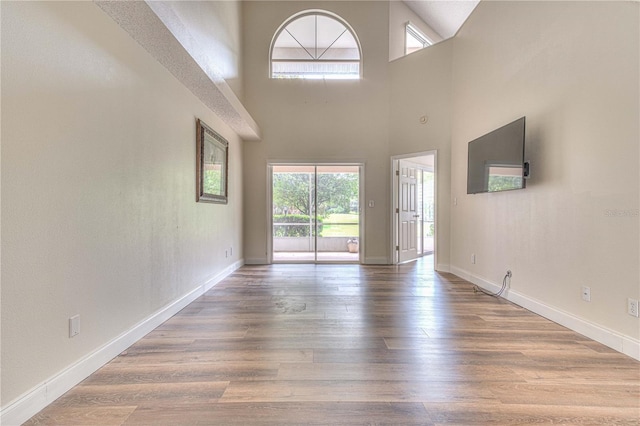 unfurnished living room with hardwood / wood-style floors