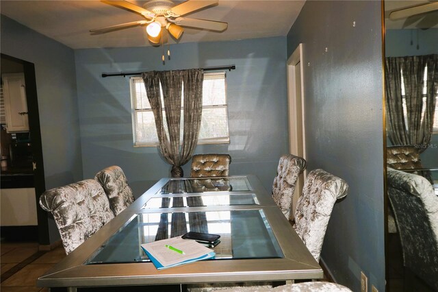 595 Benjamin Franklin Pl, Orlando, FL 32809 - tiled dining area with ceiling fan
