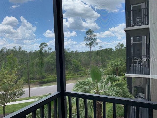 balcony with a wooded view