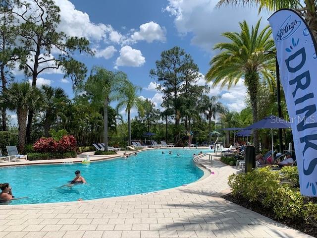 pool with a patio area