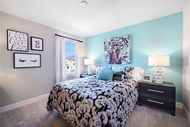 bedroom featuring dark carpet