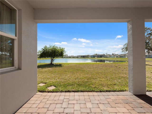 view of yard featuring a water view