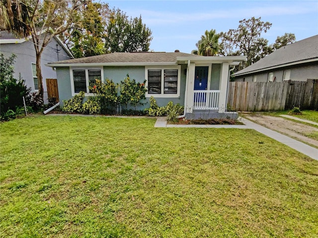 ranch-style house with a front yard