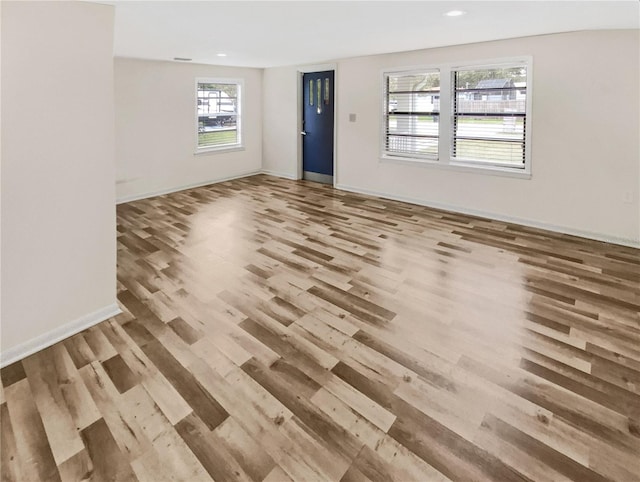 empty room featuring light hardwood / wood-style floors