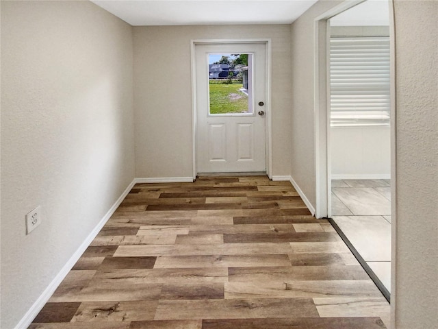 doorway featuring light wood-type flooring