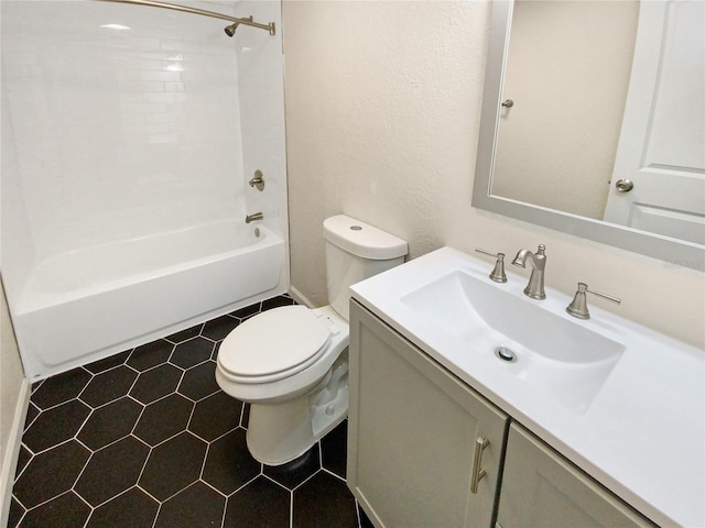 full bathroom featuring  shower combination, toilet, tile floors, and vanity