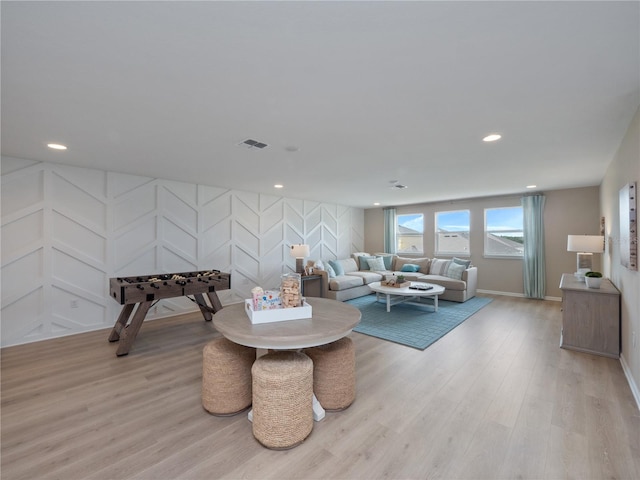 living room featuring light wood-type flooring