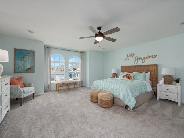 carpeted bedroom with ceiling fan