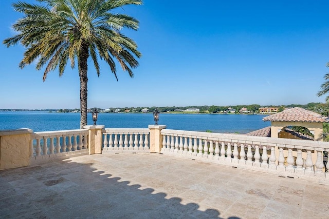 view of terrace featuring a water view