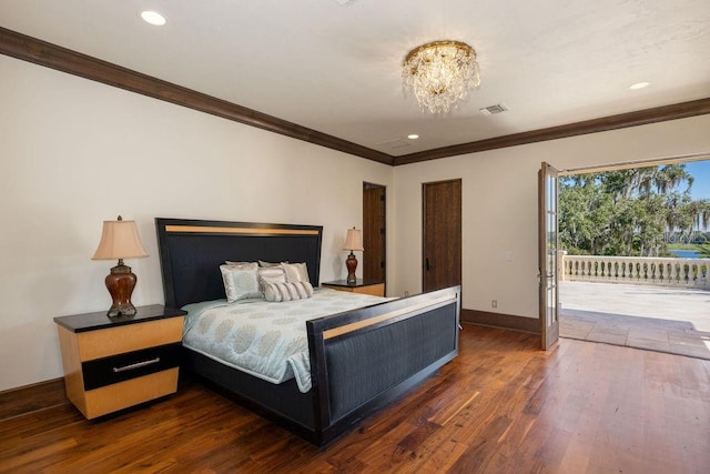 bedroom with crown molding, an inviting chandelier, dark hardwood / wood-style flooring, and access to outside