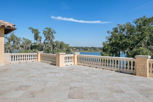 view of patio / terrace with a water view