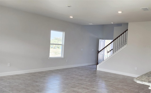 view of tiled spare room