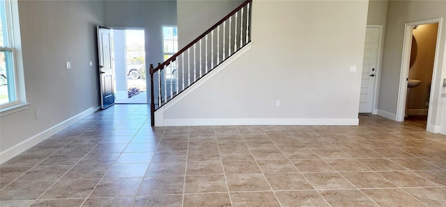 interior space with light tile patterned floors