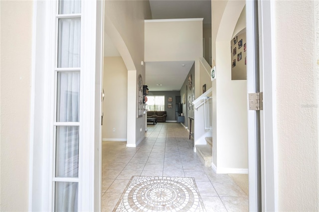 corridor with light tile floors