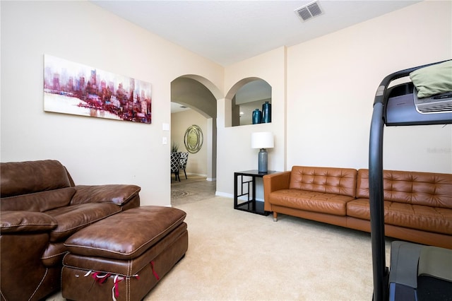 living room with light colored carpet