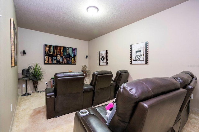 carpeted home theater room featuring a textured ceiling