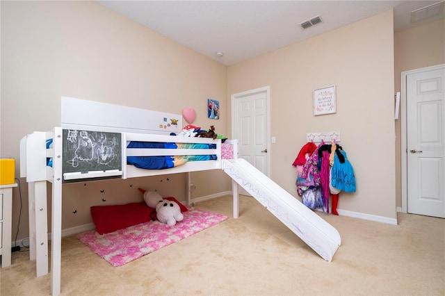 bedroom with light carpet