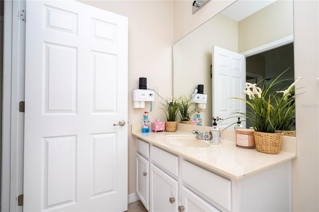 bathroom with vanity with extensive cabinet space